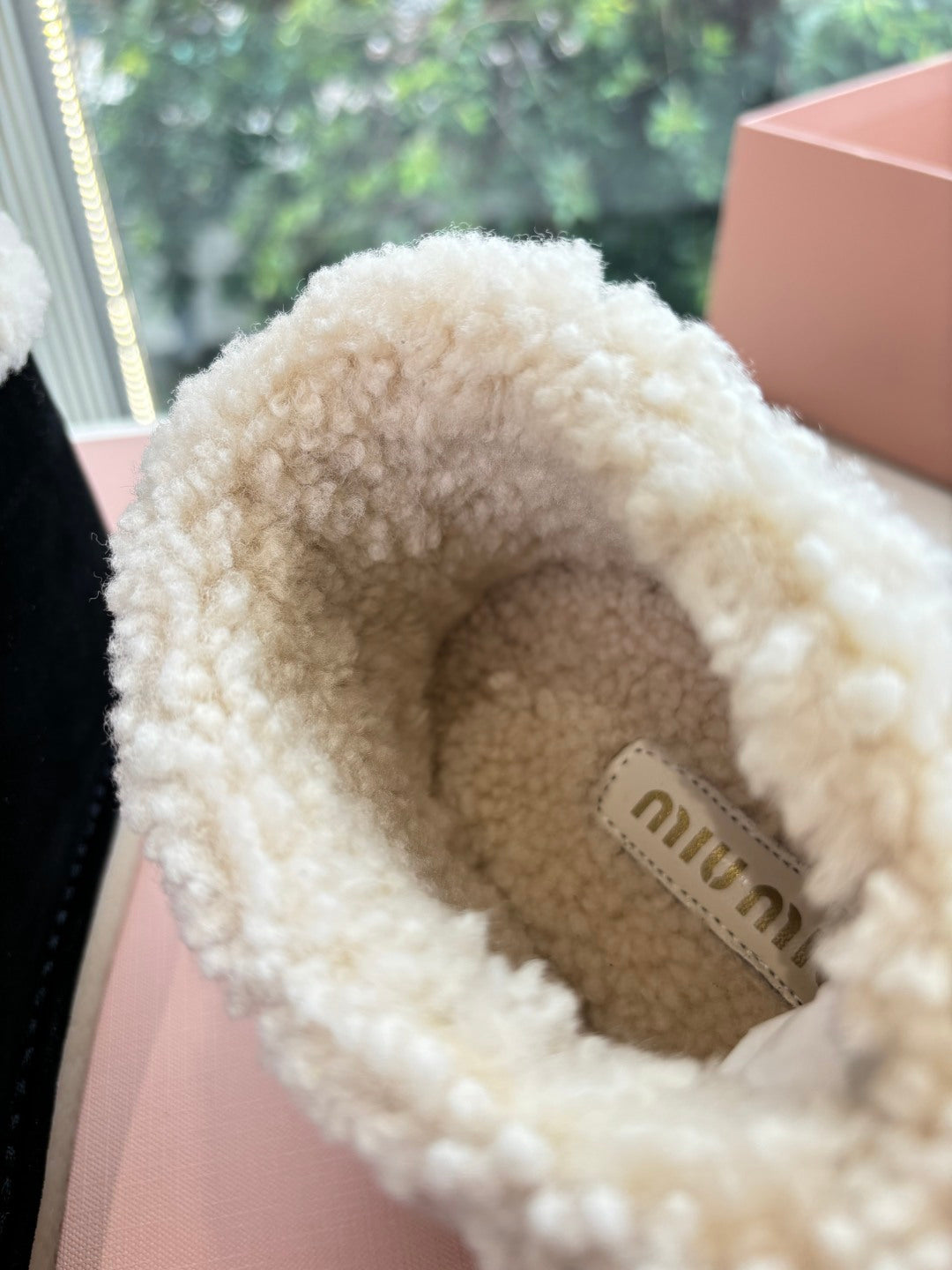 MIUMIU 26S ANKLE BOOTS IN BLACK SUEDE AND SHEARLING
