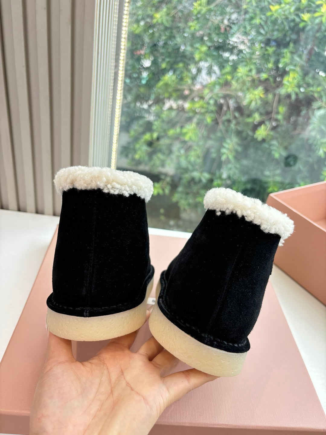 MIUMIU 26S ANKLE BOOTS IN BLACK SUEDE AND SHEARLING