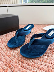 ALAIA 26S HEELED THONG SANDALS IN DARK BLUE VELVET