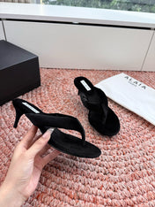 ALAIA 26S HEELED THONG SANDALS IN BLACK VELVET