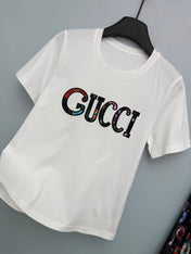GUCCI 26S T-SHIRT AND PLEATED SKIRT SET 383