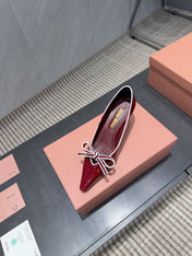 MIUMIU 26S POINTED TOE PUMPS 55MM IN DARK RED CALFSKIN WITH BOW