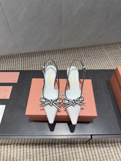 MIUMIU 26S SLINGBACK 55MM IN WHITE AND BLACK CALFSKIN WITH BOW