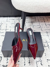 ALAIA 26S HEELED MULES 65 MM IN DARK RED GLOSSY CALFSKIN