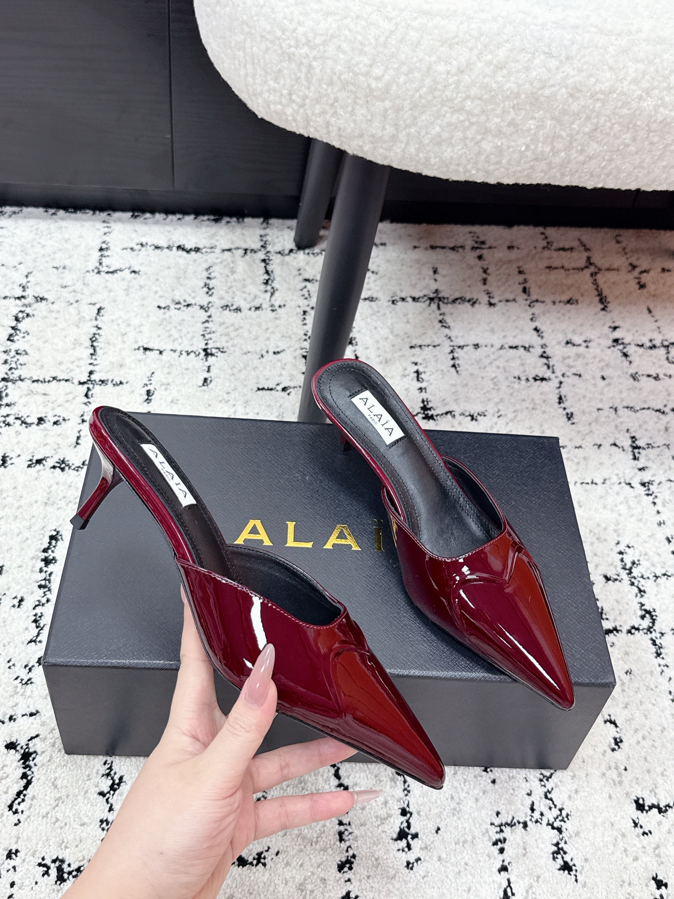 ALAIA 26S HEELED MULES 65 MM IN DARK RED GLOSSY CALFSKIN