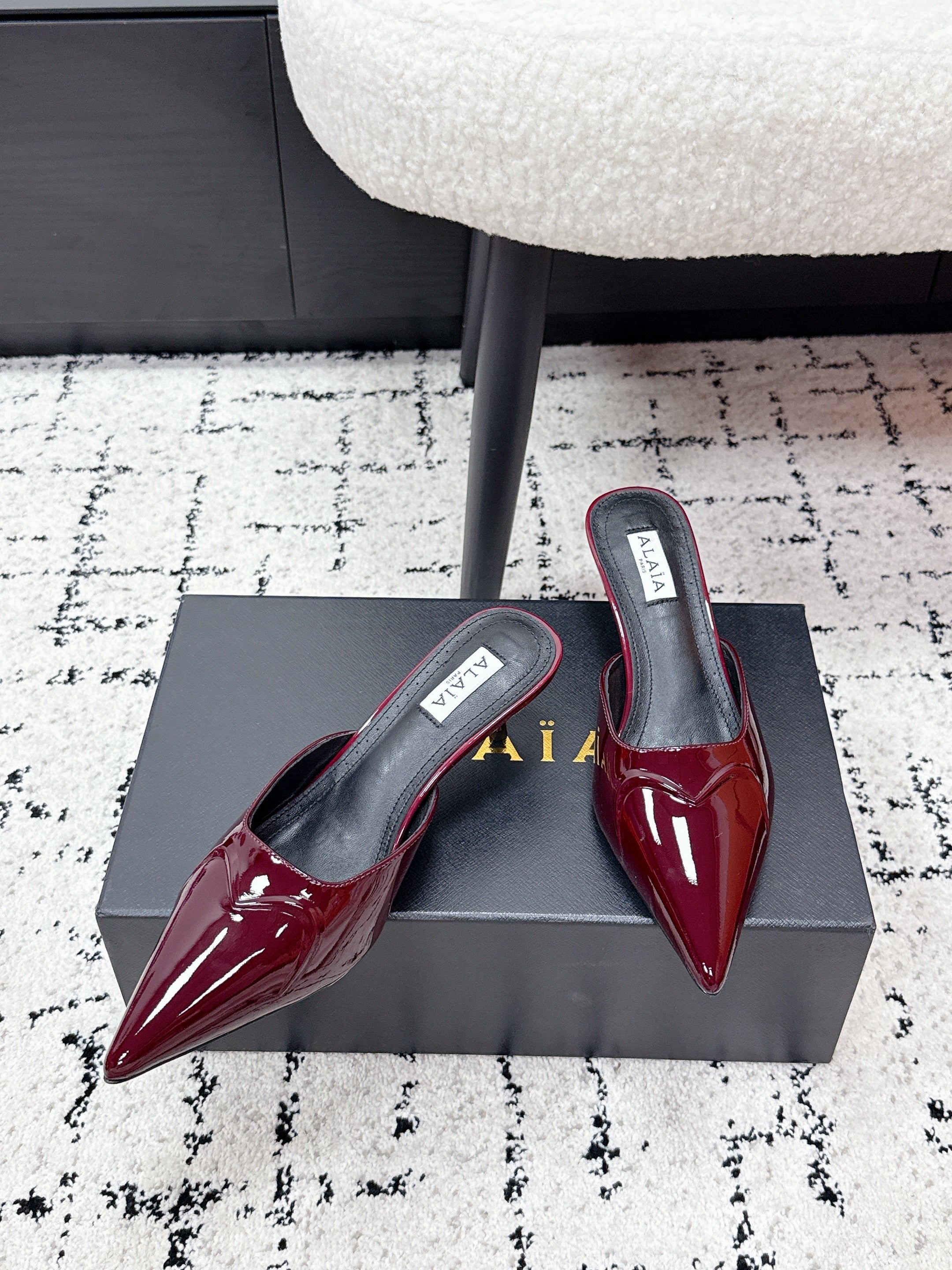ALAIA 26S HEELED MULES 65 MM IN DARK RED GLOSSY CALFSKIN