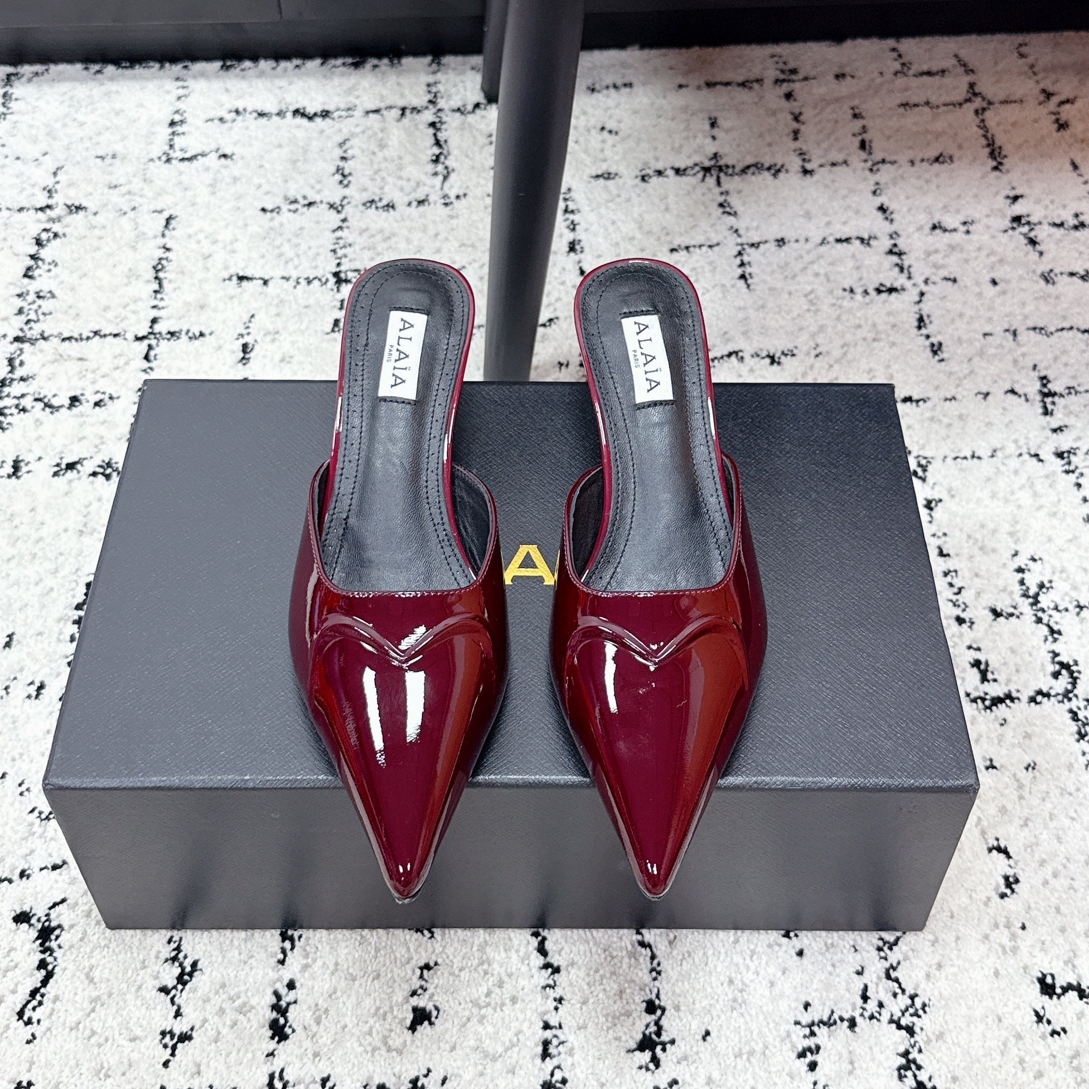 ALAIA 26S HEELED MULES 65 MM IN DARK RED GLOSSY CALFSKIN
