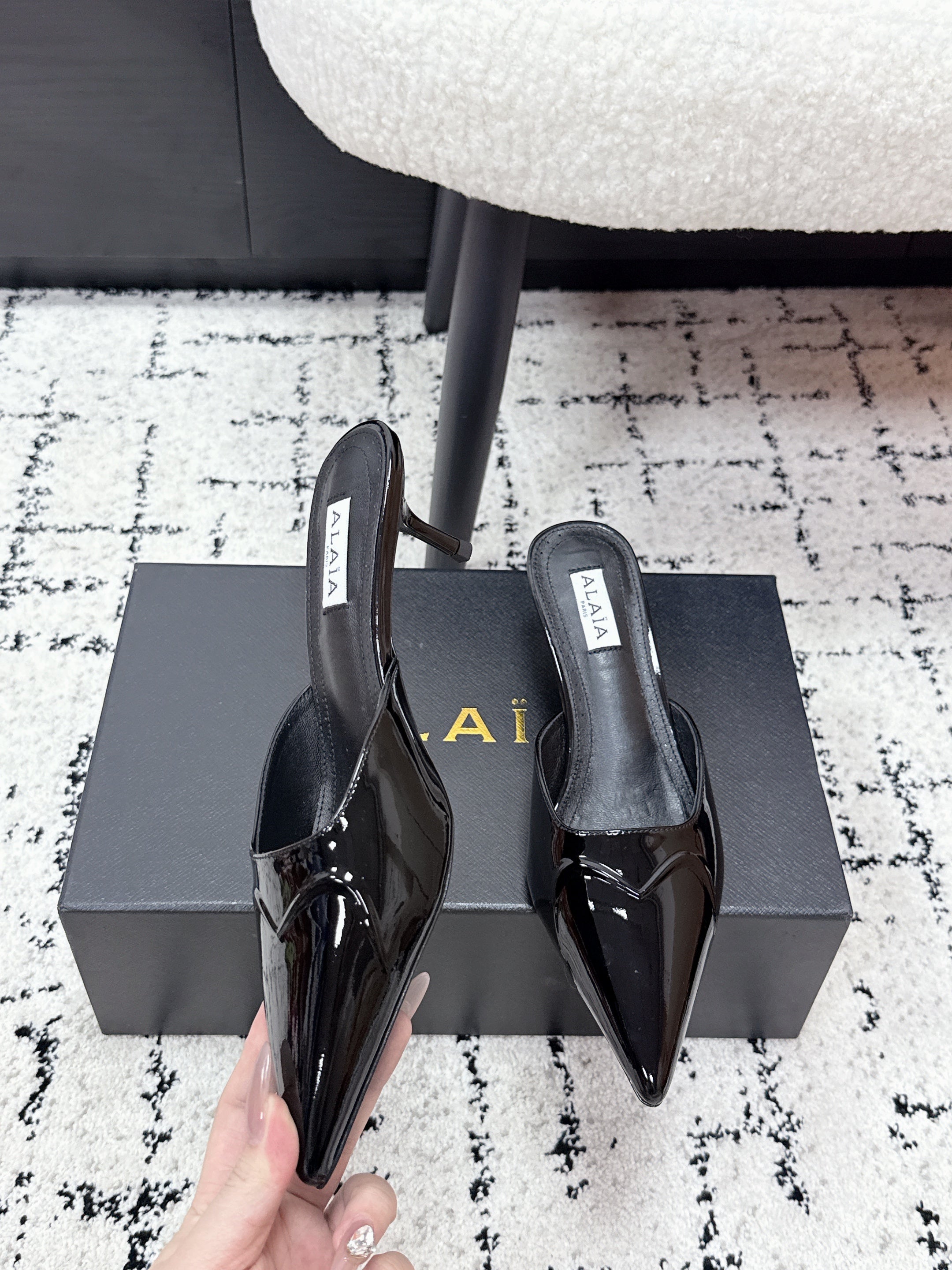 ALAIA 26S HEELED MULES 65 MM IN BLACK GLOSSY CALFSKIN