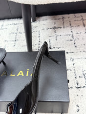 ALAIA 26S HEELED MULES 65 MM IN BLACK GLOSSY CALFSKIN