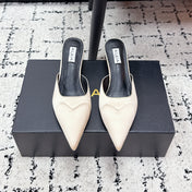 ALAIA 26S HEELED MULES 65 MM IN IVORY BEIGE SATIN