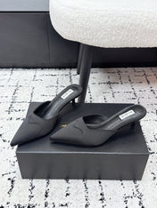 ALAIA 26S HEELED MULES 65 MM IN BLACK SATIN