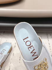 LOEWE 26S FLAT SANDALS IN LIGHT BLUE LOGO GOLD HARDWARE
