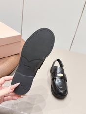 MIUMIU 26S PENNY SLINGBACK LOAFERS IN BLACK CALFSKIN GOLD HARDWARE