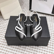 CHANEL 26S SLINGBACK FLATS IN BLACK CALFSKIN WITH WHITE TRIM