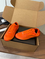 PRADA 25S SNEAKER IN ORANGE SILK