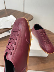 THE ROW 26S SNEAKERS IN BURGUNDY RED CALFSKIN