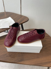 THE ROW 26S SNEAKERS IN BURGUNDY RED CALFSKIN