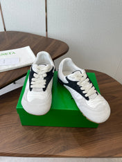 BOTTEGA VENETA 26S ORBIT FLASH SNEAKERS IN WHITE AND BLACK SUEDE