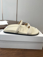 THE ROW 26S DOUBLE STRAP FLAT SANDALS IN IVORY WHITE CALFSKIN