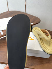 THE ROW 26S PUFFED THONG SANDALS IN BUTTER YELLOW CALFSKIN