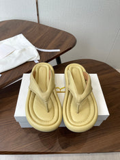 THE ROW 26S PUFFED THONG SANDALS IN BUTTER YELLOW CALFSKIN