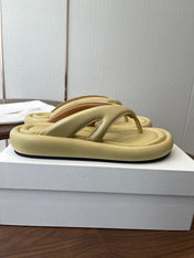 THE ROW 26S PUFFED THONG SANDALS IN BUTTER YELLOW CALFSKIN