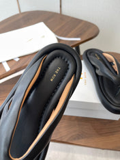 THE ROW 26S PUFFED THONG SANDALS IN BLACK CALFSKIN