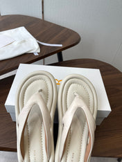 THE ROW 26S PUFFED THONG SANDALS IN IVORY WHITE CALFSKIN