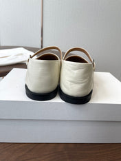 THE ROW 26S MARY JANE FLATS IN WHITE PATENT CALFSKIN
