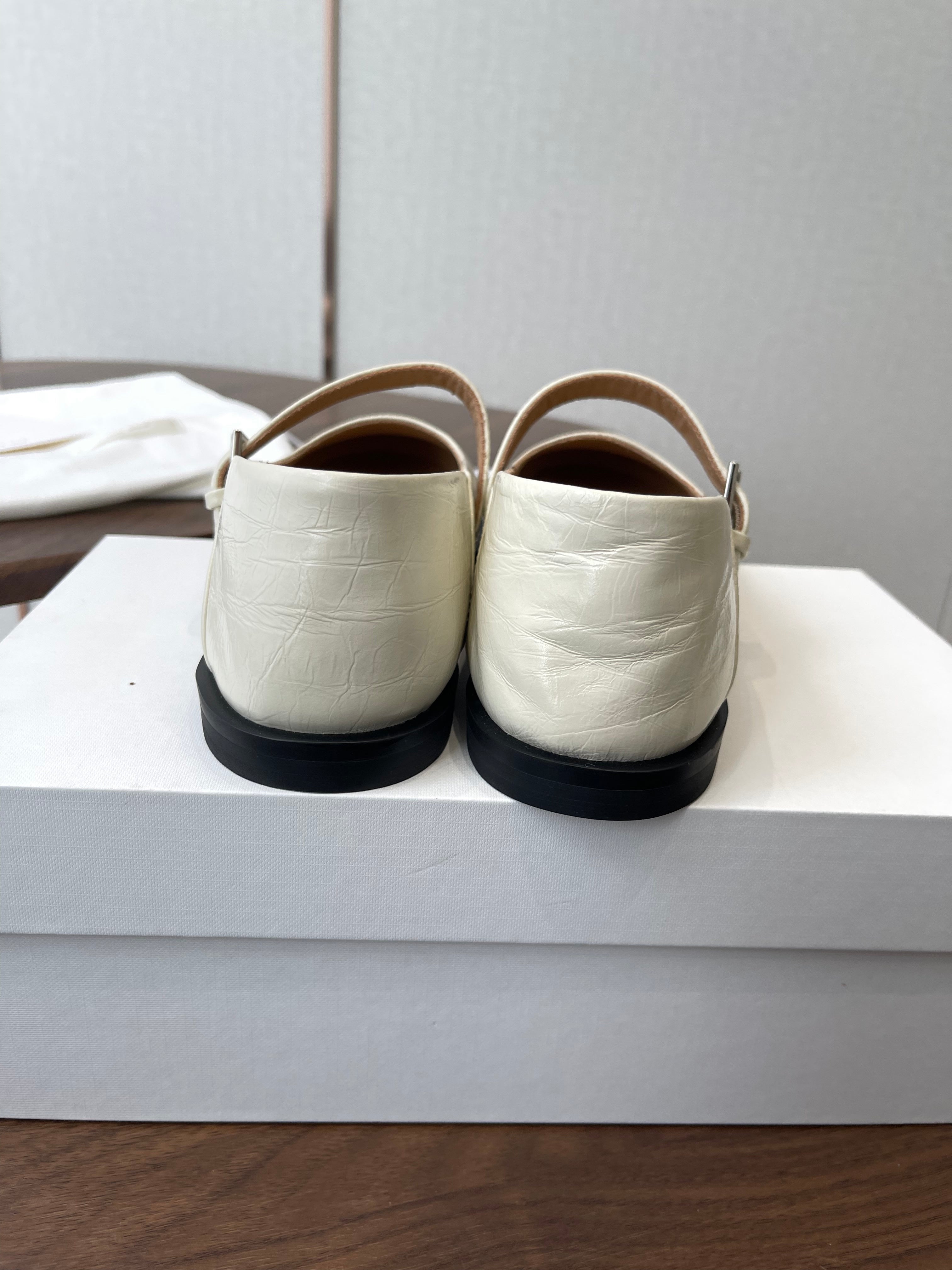 THE ROW 26S MARY JANE FLATS IN WHITE PATENT CALFSKIN