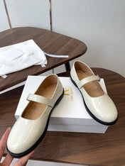 THE ROW 26S MARY JANE FLATS IN WHITE PATENT CALFSKIN