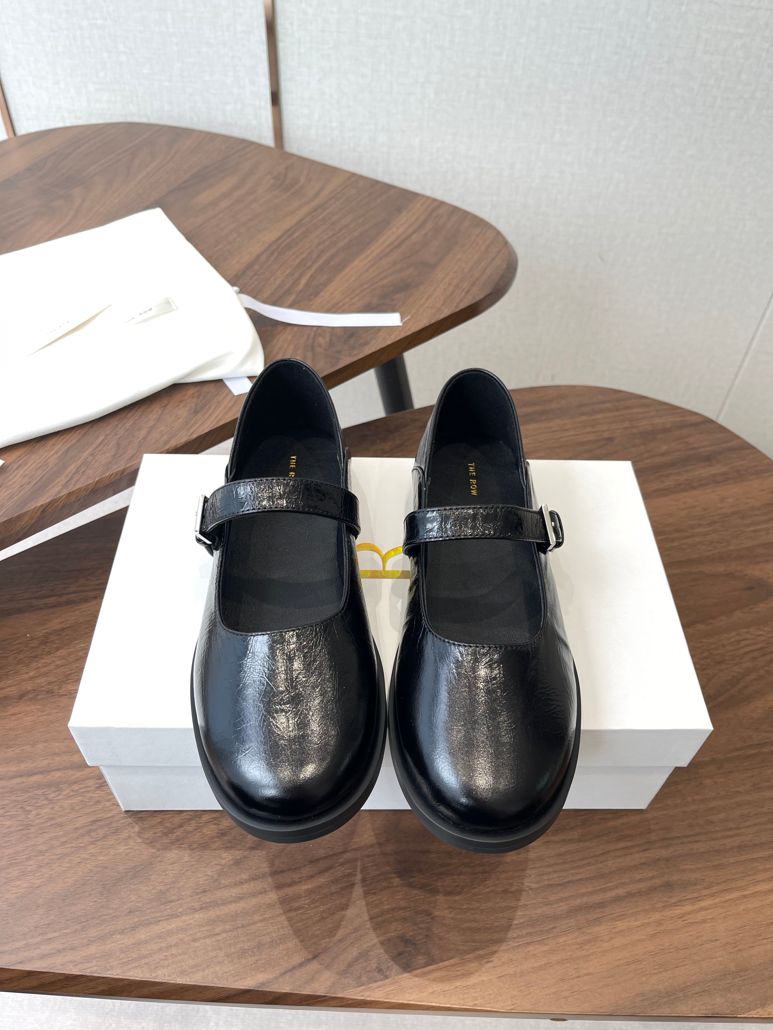 THE ROW 26S MARY JANE FLATS IN BLACK PATENT CALFSKIN