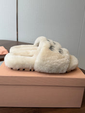 MIUMIU 26S CRYSTAL LOGO SLIDES IN LIGHT BEIGE SHEARLING
