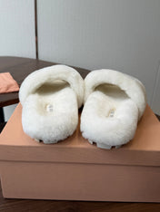 MIUMIU 26S CRYSTAL LOGO SLIDES IN WHITE SHEARLING