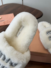 MIUMIU 26S CRYSTAL LOGO SLIDES IN WHITE SHEARLING