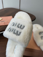 MIUMIU 26S CRYSTAL LOGO SLIDES IN WHITE SHEARLING
