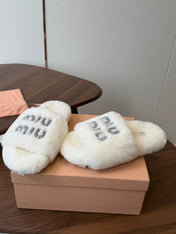 MIUMIU 26S CRYSTAL LOGO SLIDES IN WHITE SHEARLING