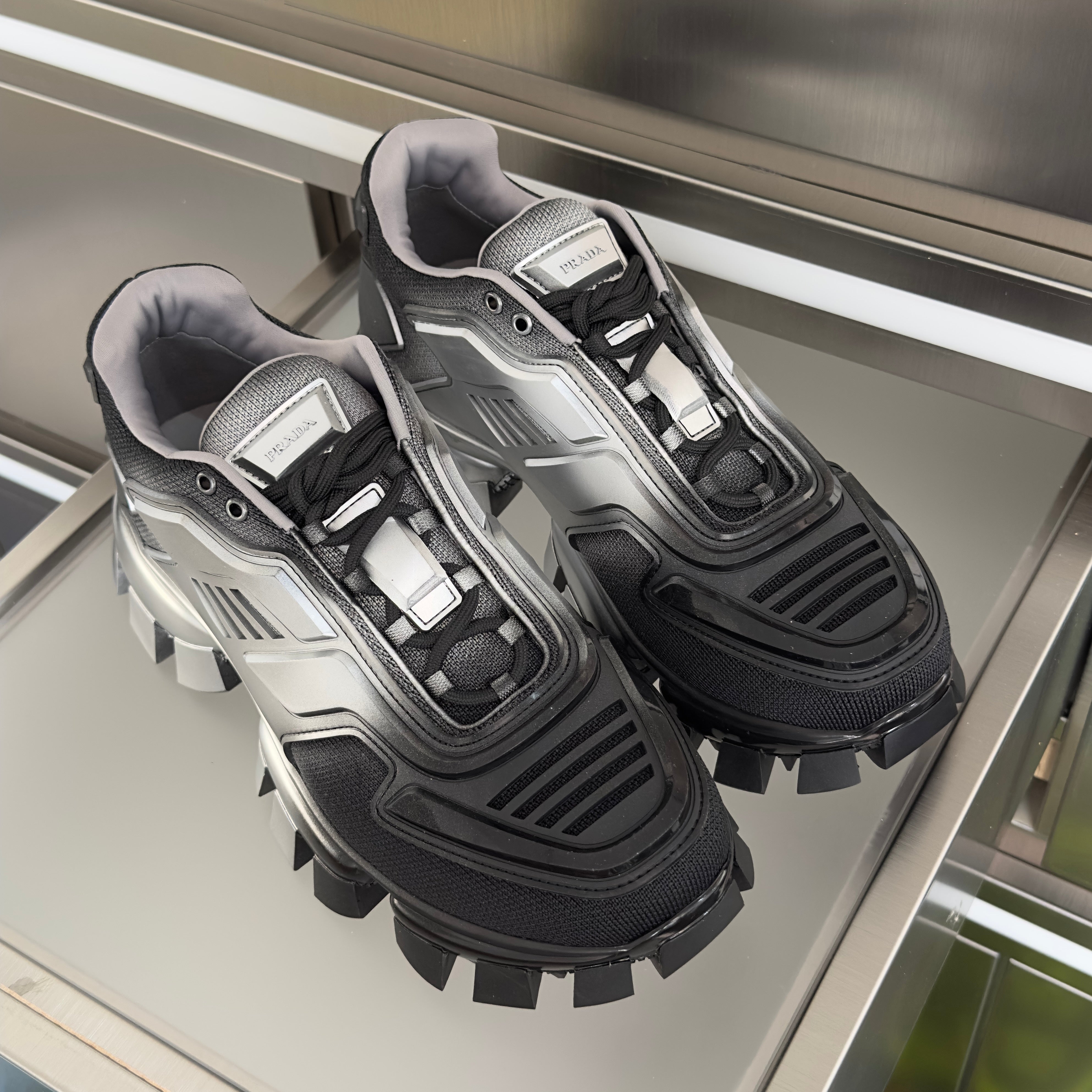 PRADA 26S CLOUDBUST THUNDER SNEAKERS 60MM IN BLACK AND SILVER MESH FABRIC AND TPU
