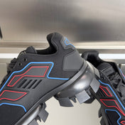 PRADA 26S CLOUDBUST THUNDER SNEAKERS 60MM IN BLACK AND RED MESH FABRIC AND TPU
