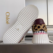 CHLOÉ 26S WEDGE SNEAKERS 70 MM IN WHITE CALFSKIN AND LEOPARD PRINT PONY HAIR