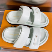 LV 26S PADDED SLIDES 40MM IN MINT GREEN CALFSKIN MONOGRAM
