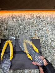 ALAIA 26S THONG SANDALS IN YELLOW SATIN AND TRANSPARENT PVC