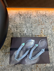 ALAIA 26S THONG SANDALS IN PASTEL BLUE SATIN AND TRANSPARENT PVC