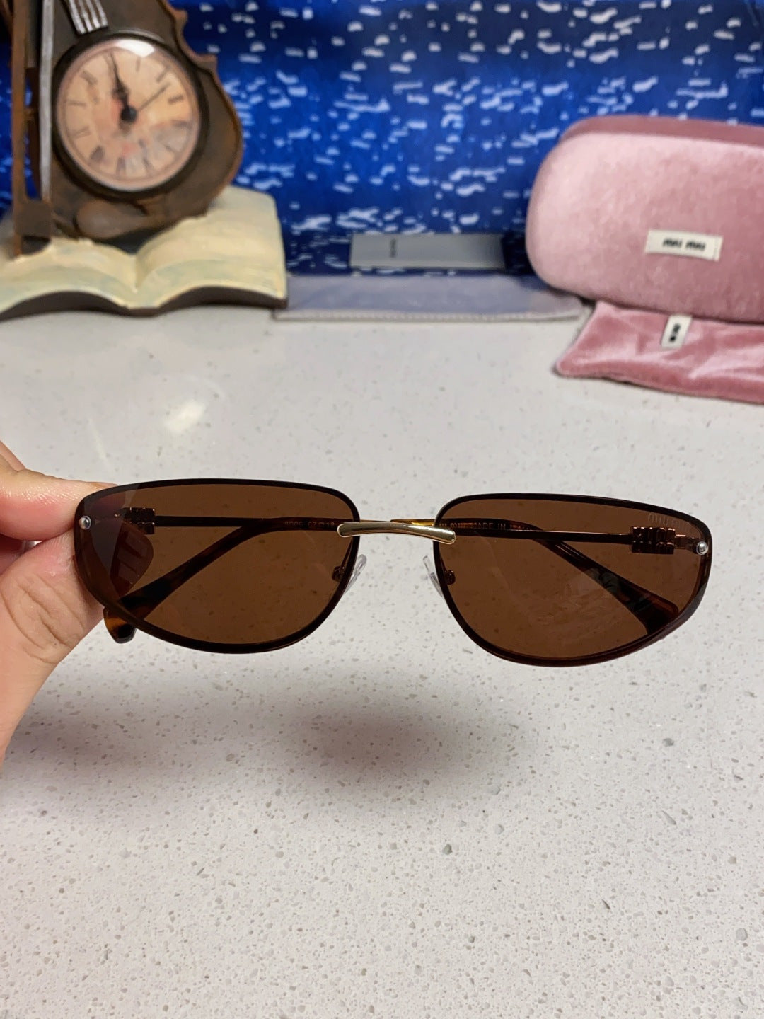 MIUMIU 26S RECTANGULAR FRAME IN METAL 426398