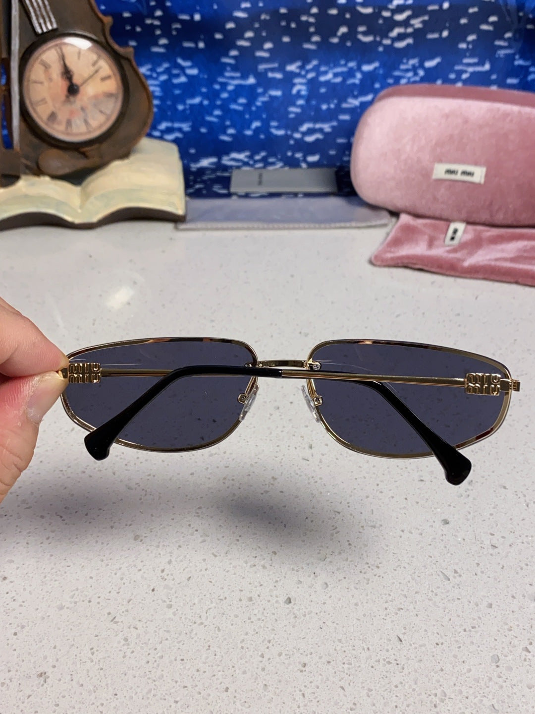 MIUMIU 26S RECTANGULAR FRAME IN METAL 426400