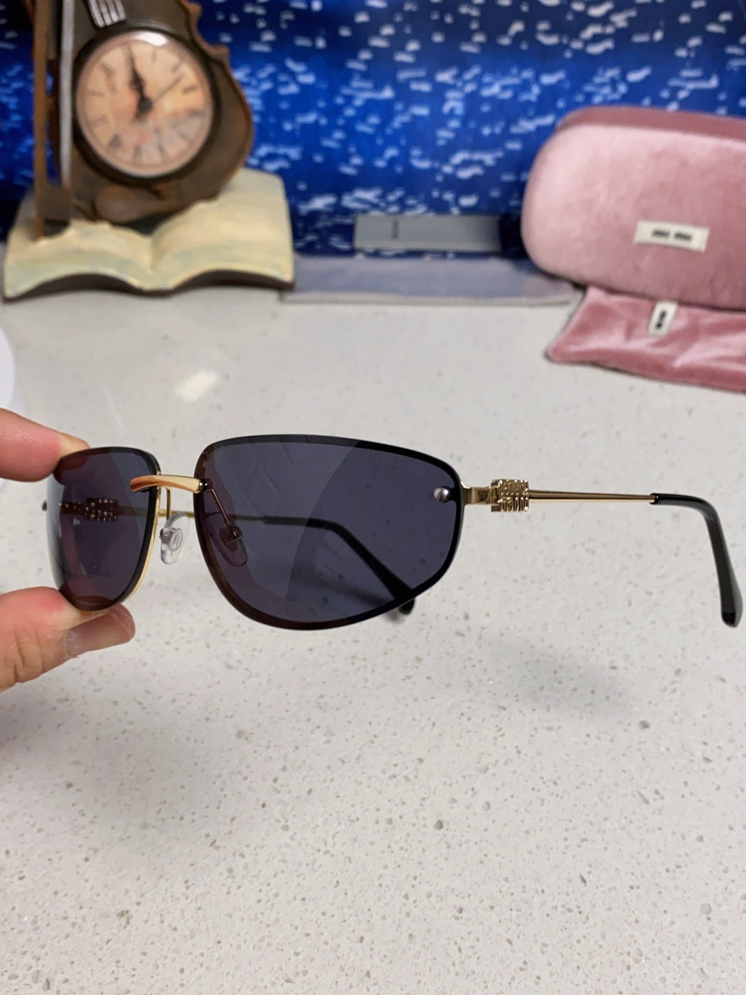 MIUMIU 26S RECTANGULAR FRAME IN METAL 426400