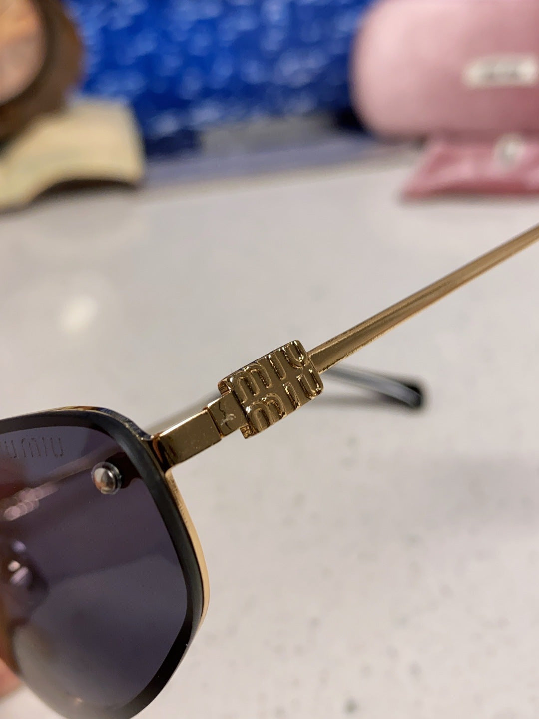MIUMIU 26S RECTANGULAR FRAME IN METAL 426400