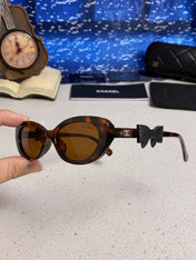 CHANEL 26S SLIM OVAL FRAME IN BROWN ACETATE 404787