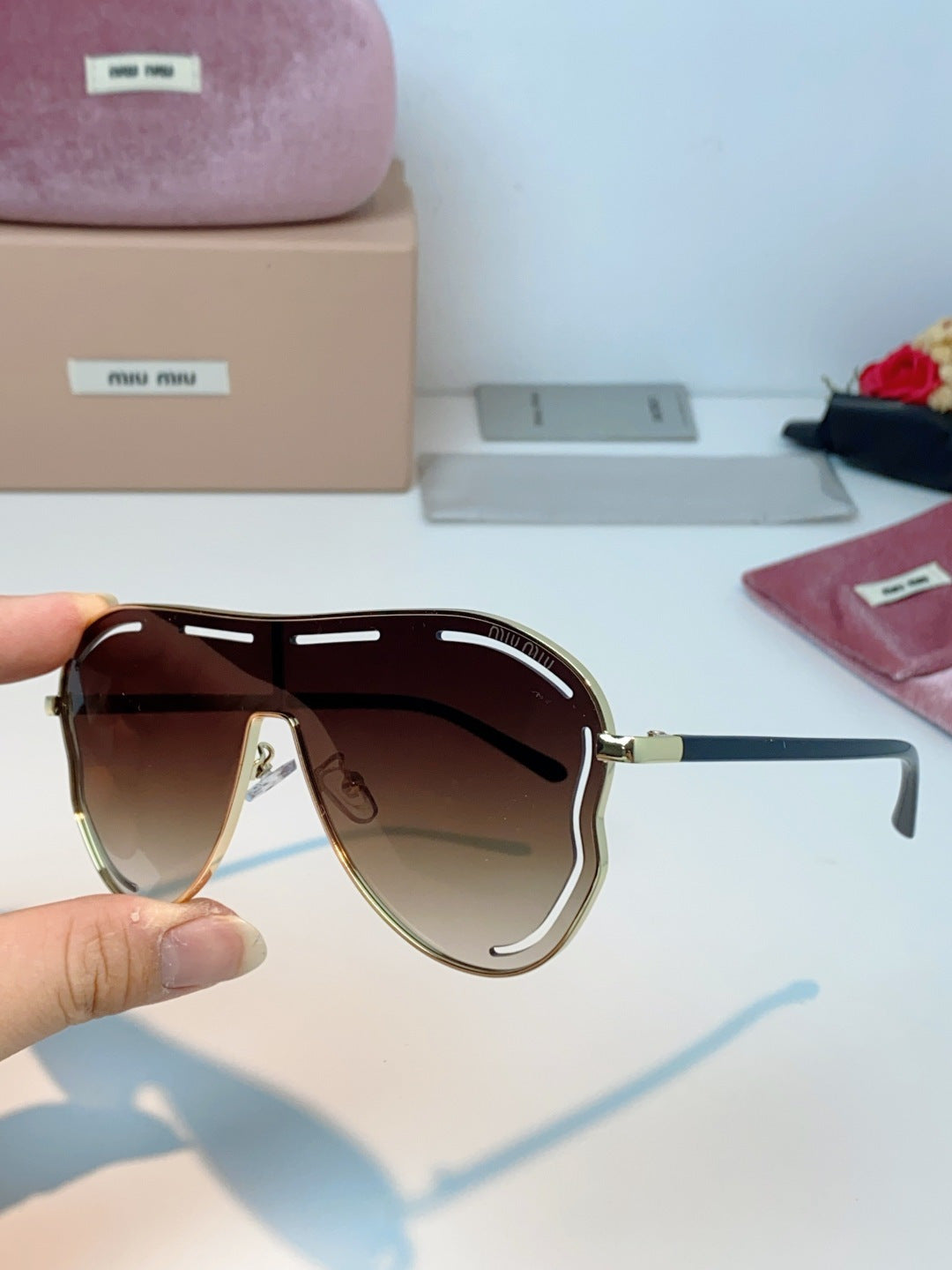 MIUMIU 26S SHIELD FRAME IN METAL 424496