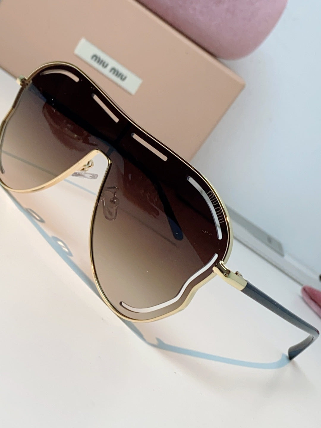MIUMIU 26S SHIELD FRAME IN METAL 424496